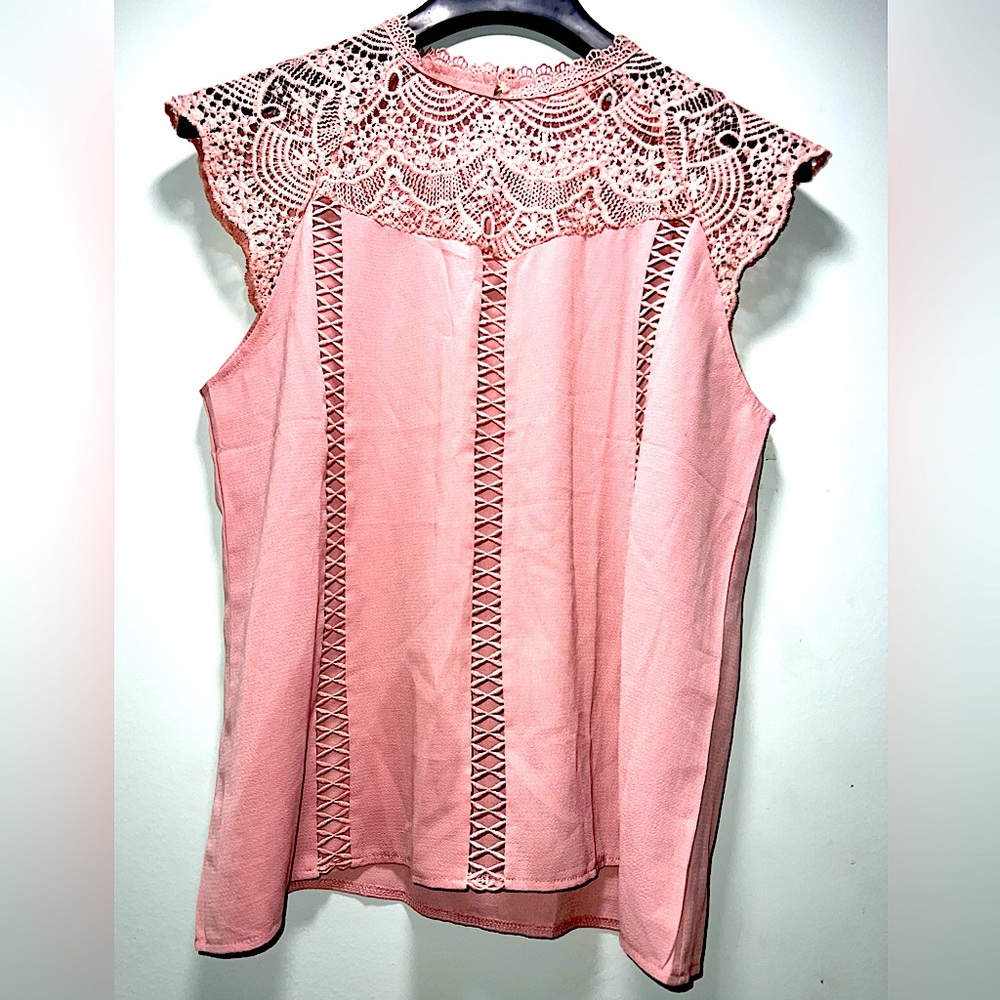 Pink women’s sleeveless blouse size medium